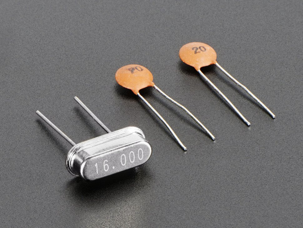 16 MHz Crystal + 20pF capacitors